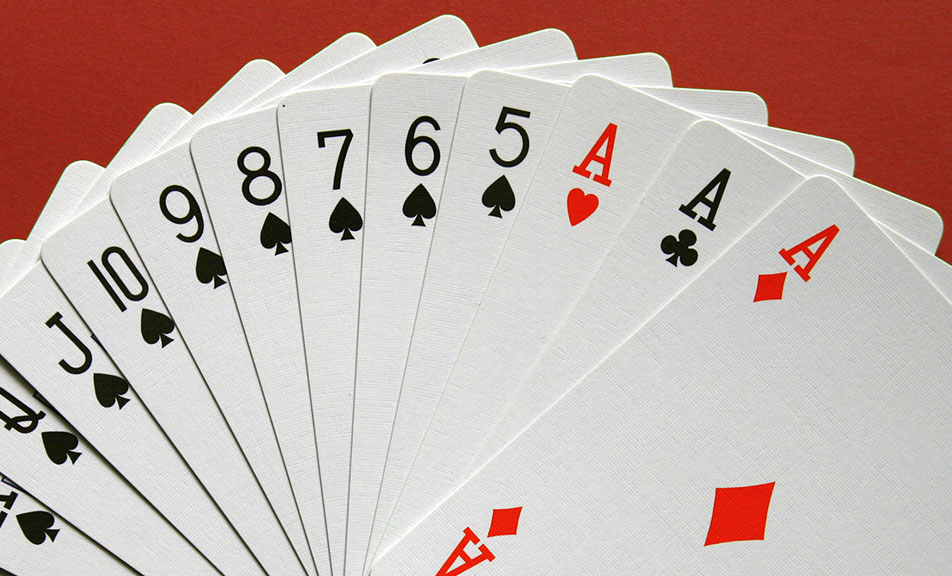 playing cards on a red background